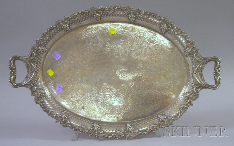 Appraisal: Silver Plated Handled Serving Tray with reticulated edge work and