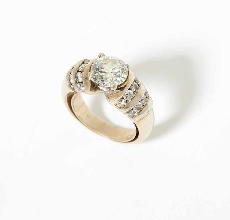 Appraisal: A diamond and gold ring Stamped K centering a round