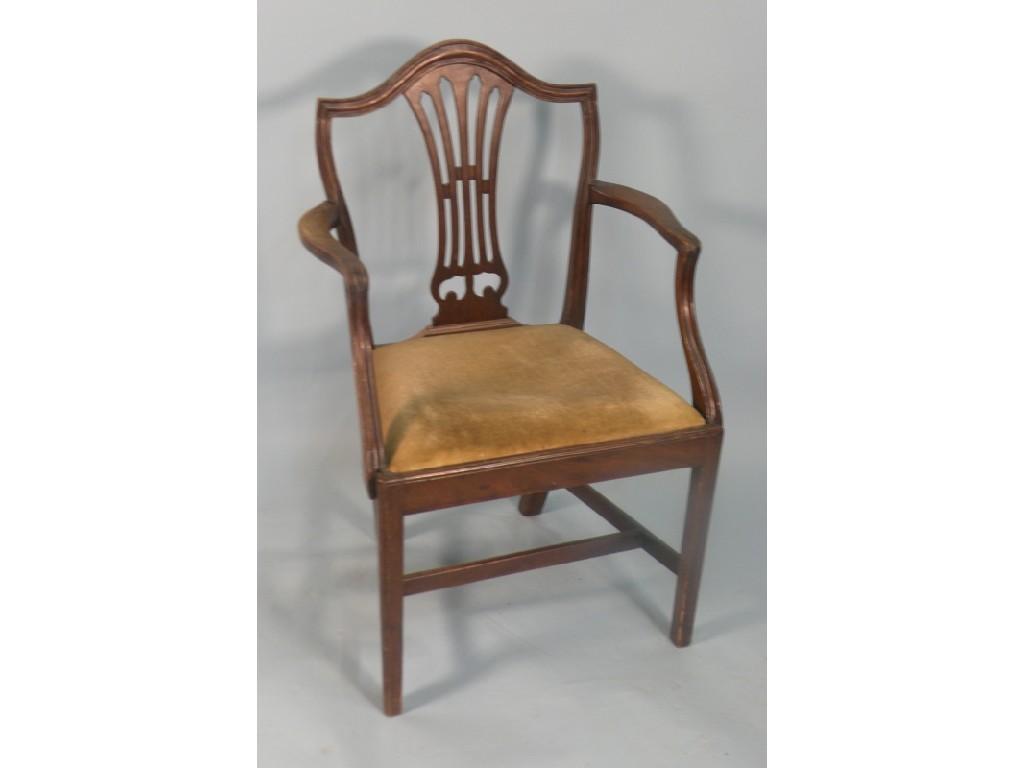 Appraisal: A thC mahogany open armchair with a pierced splat and