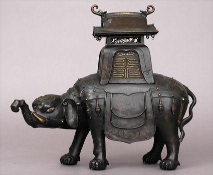 Appraisal: CHINESE BRONZE ELEPHANT-FORM CENSER AND COVER Modeled with upraised trunk