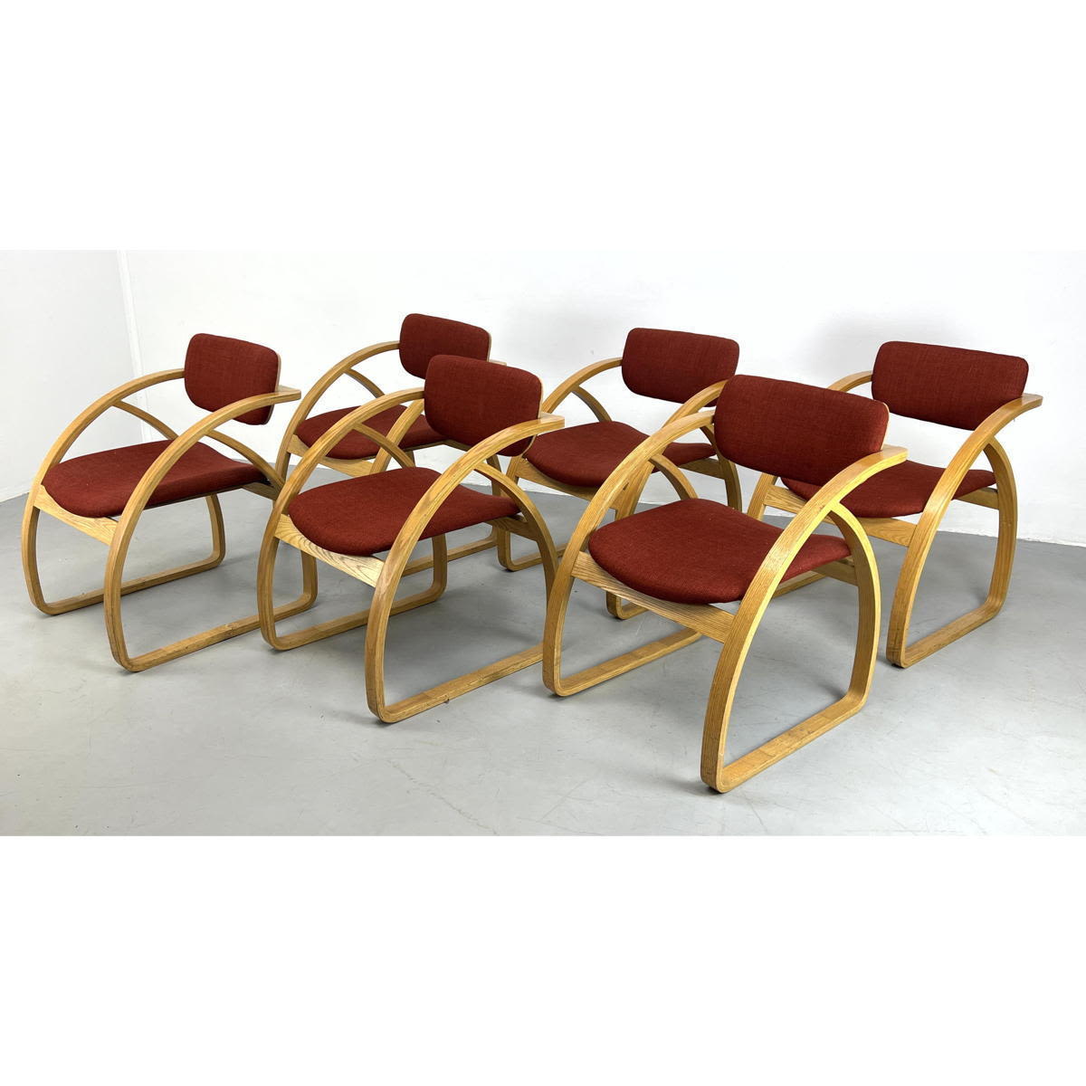 Appraisal: Set Oak Modernist Dining Chairs Cantilever seat on curved form