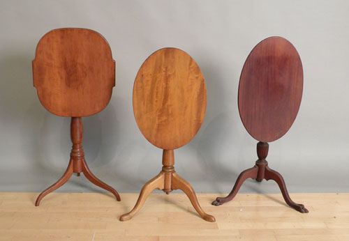 Appraisal: Three tilt top candlestands early th c