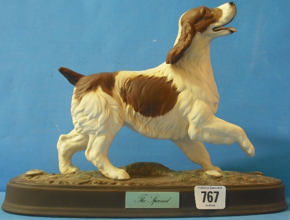 Appraisal: Beswick The Spaniel on ceramic plinth brown and white matt