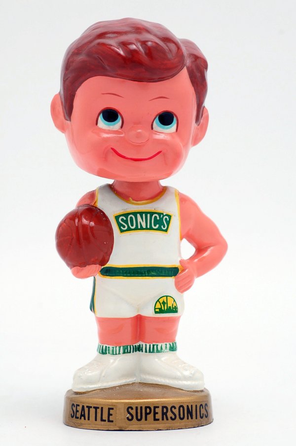 Appraisal: Contemporary Seattle Supersonics bobblehead boy atop a gold base with