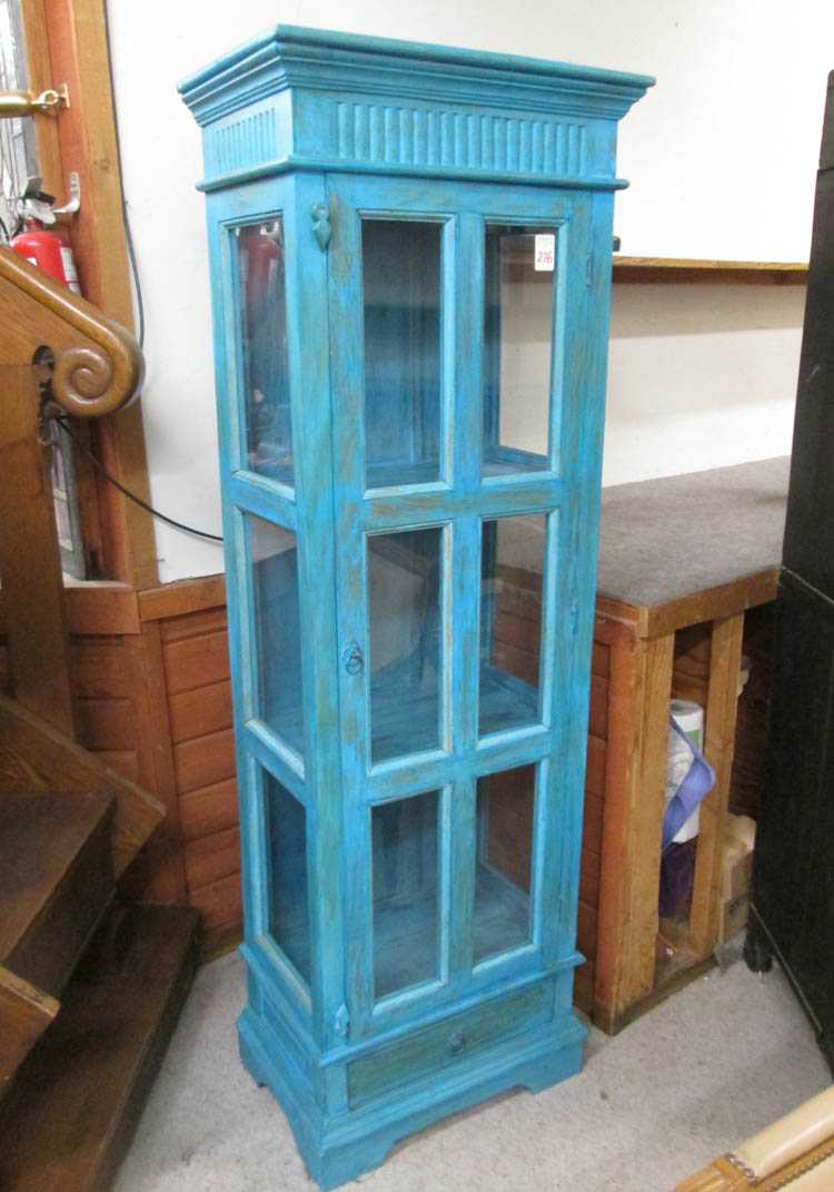 Appraisal: THREE-LEVEL CURIO CABINET hardwood construction with painted turquoise finish inside