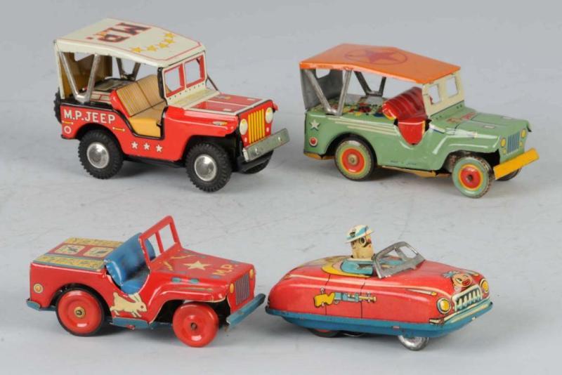 Appraisal: Lot of Tin Litho Vehicle Friction Toys Description Japanese Working