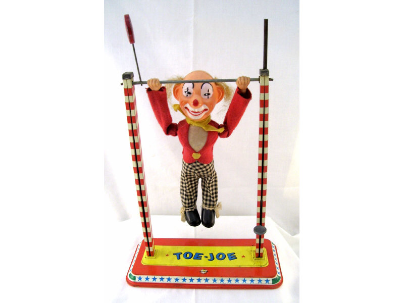 Appraisal: Ohio Art Toe Joe Lever action mechanical acrobatic clown Working