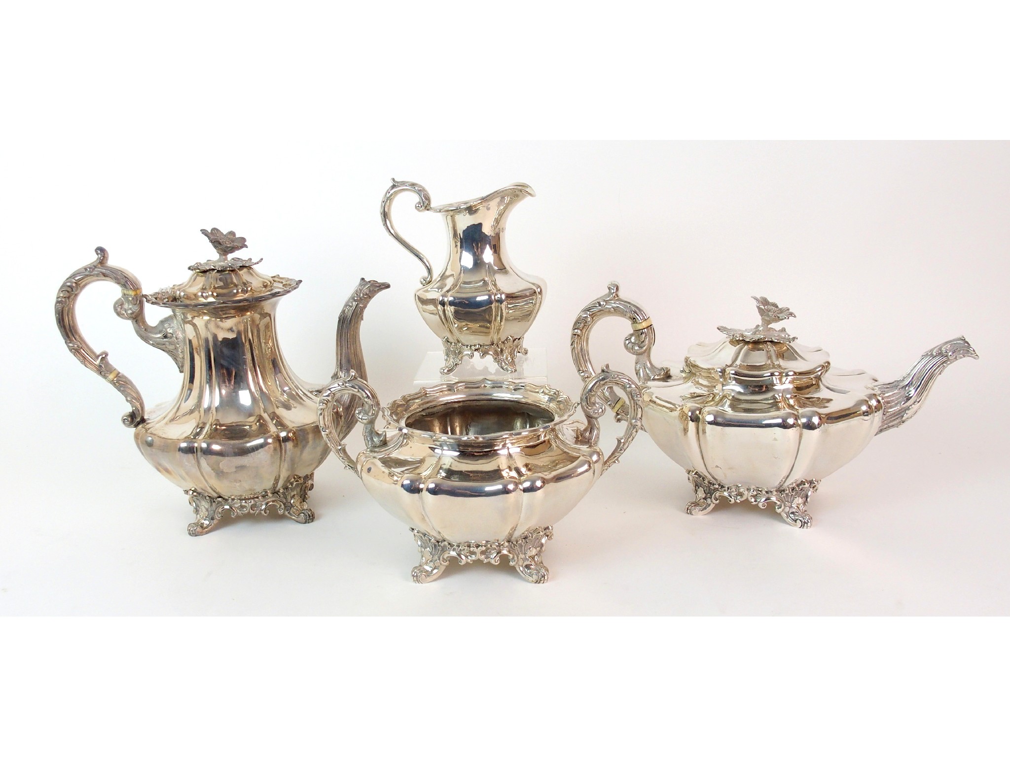 Appraisal: A three piece Indian silver tea serviceby Hamilton Co Calcutta