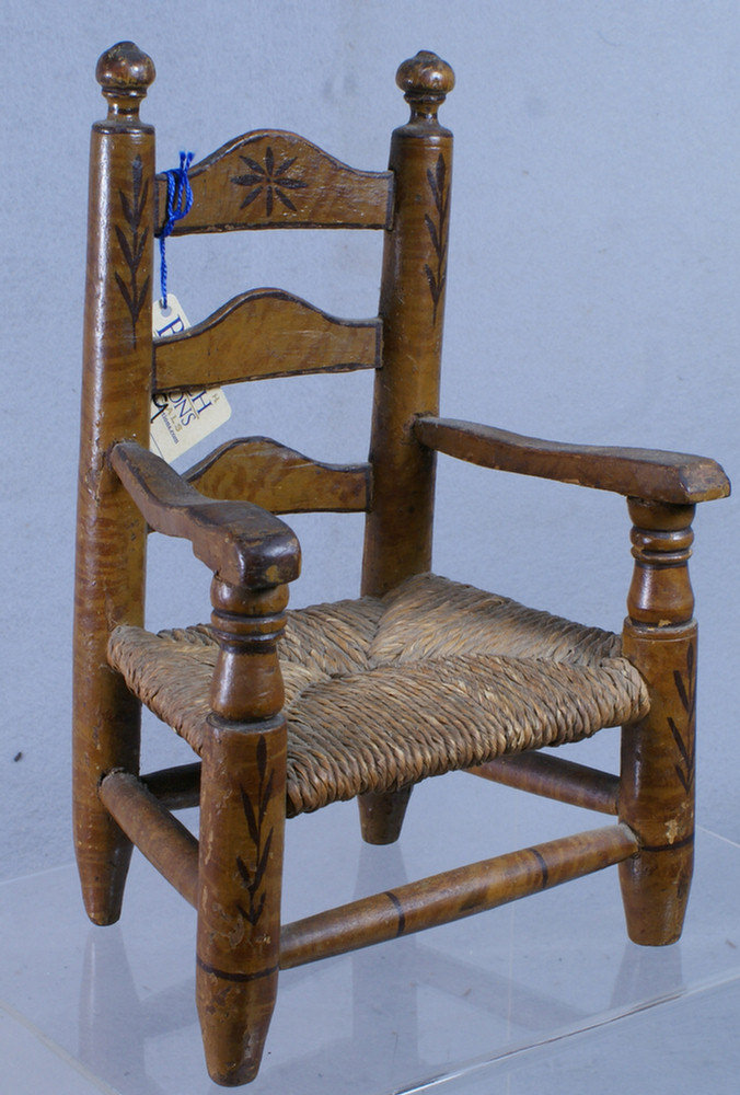 Appraisal: Miniature slat ladderback armchair with brown painted tiger maple simulated