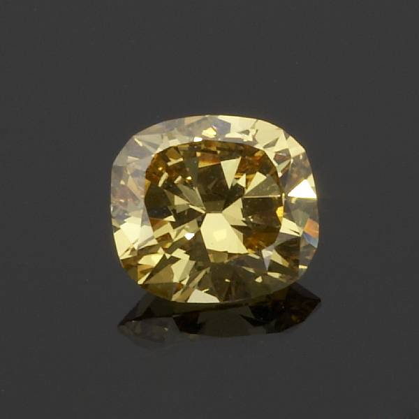 Appraisal: An unmounted colored diamond the cushion-cut diamond weighing carats