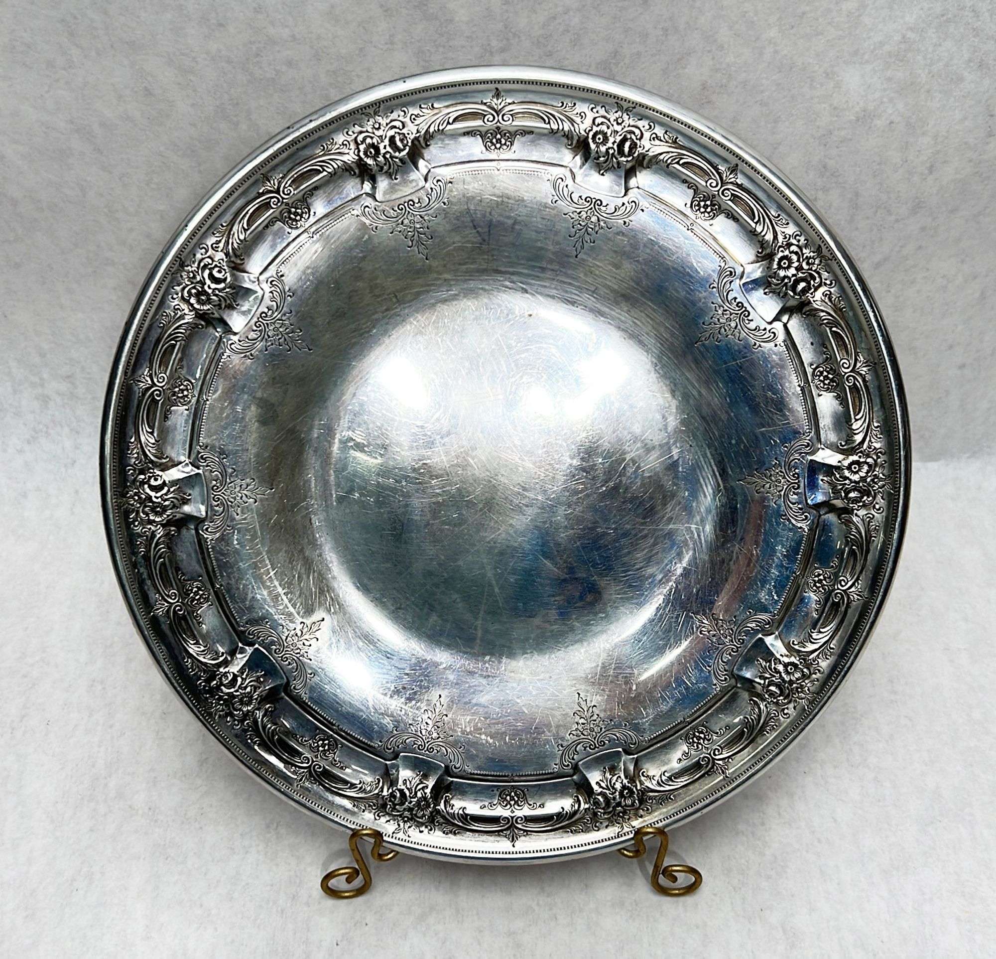 Appraisal: Sterling Silver Chased Rim Plate in diameter ozt