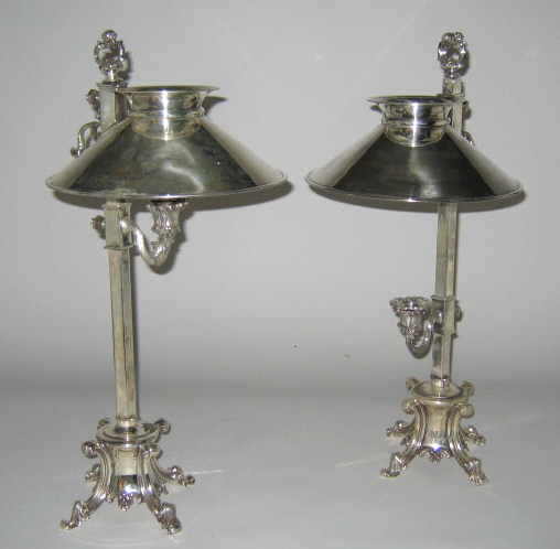 Appraisal: PAIR OF SHEFFIELD PLATED SILVER DESK CANDLE LAMPS Four-sided standards