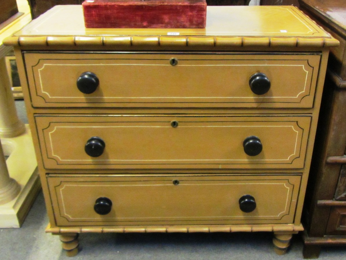 Appraisal: A th century borwn painted chest of three long drawers