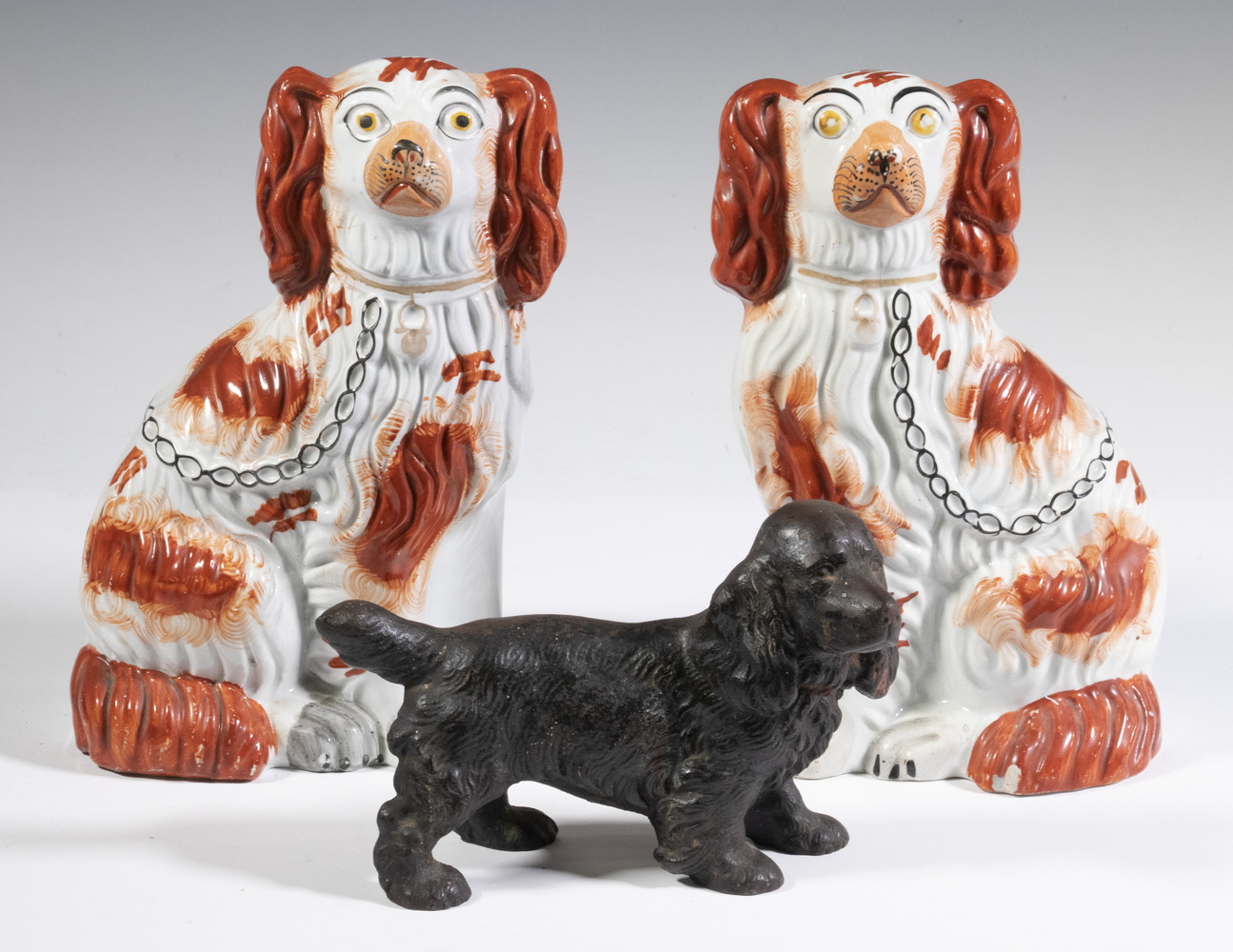 Appraisal: VINTAGE DOG FIGURINES Including Pair of Staffordshire pottery King Charles