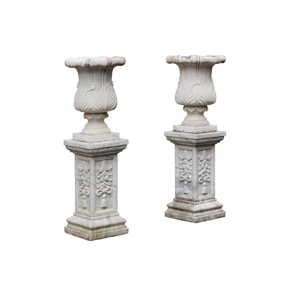 Appraisal: PAIR OF WHITE MARBLE URNS AND STANDS MODERN the leaf-carved