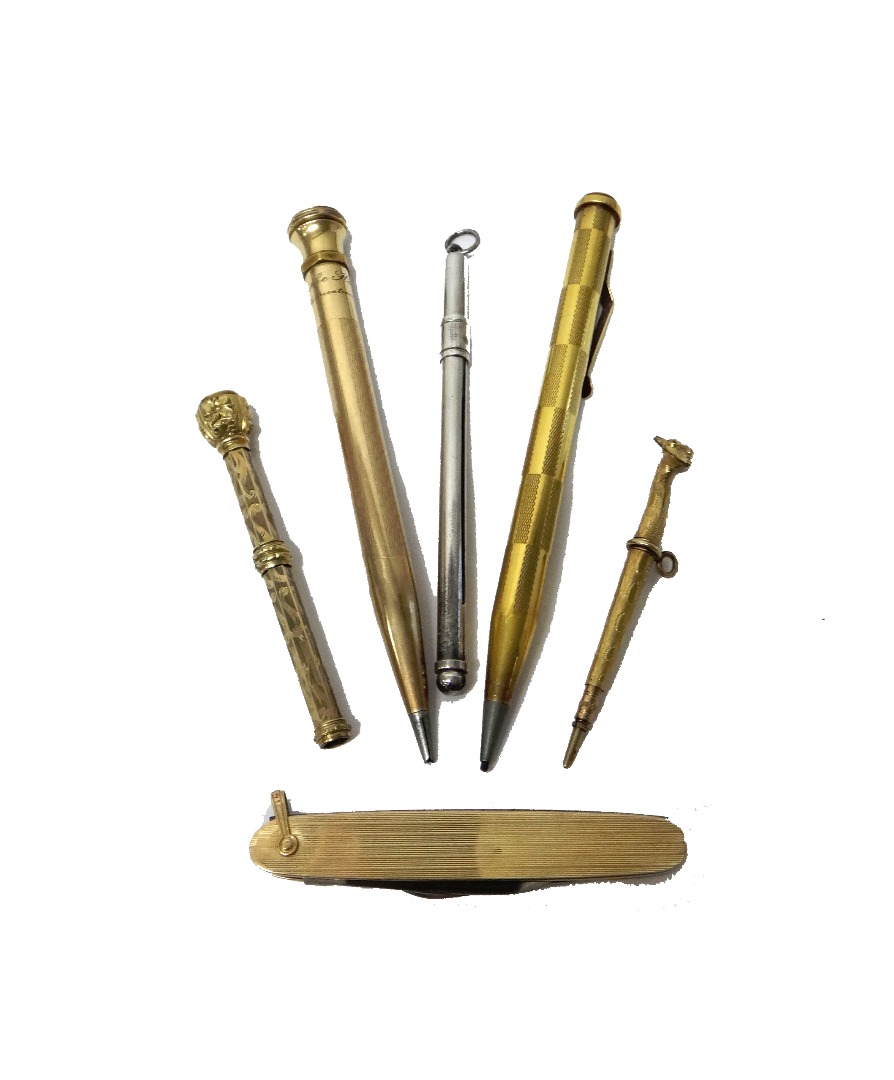 Appraisal: A gold cased propelling pencil decorated with engine turned panels