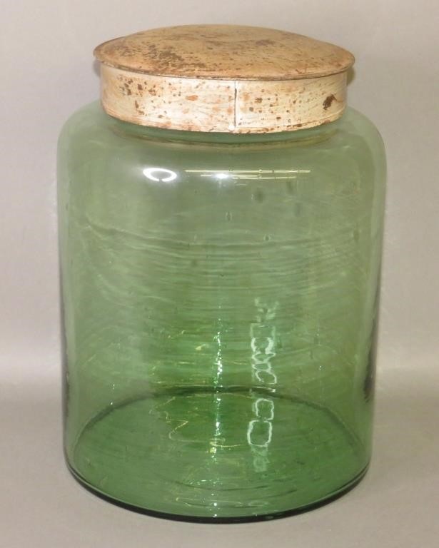 Appraisal: LARGE BLOWN GREEN GLASS CANISTER JAR WITH TIN LIDca late