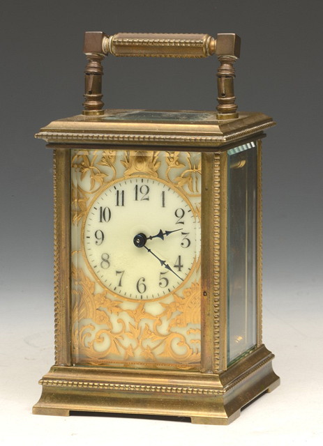 Appraisal: A TH CENTURY FRENCH BRASS CARRIAGE CLOCK with gilt enamel