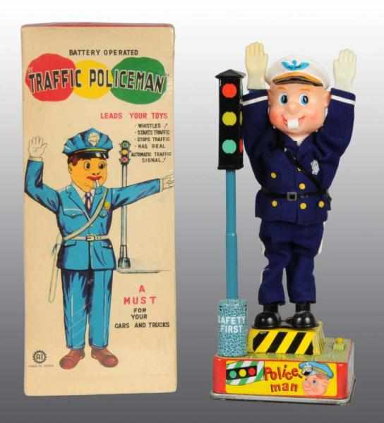 Appraisal: Tin Traffic Policeman Battery-Operated Toy Description Japanese Working Original clothes