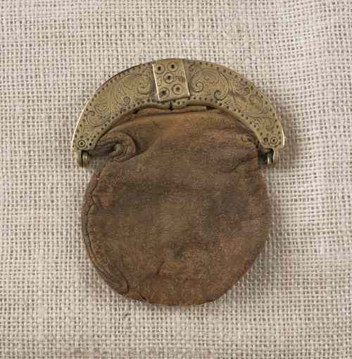 Appraisal: Early Continental leather and brass purse th c with scrolled