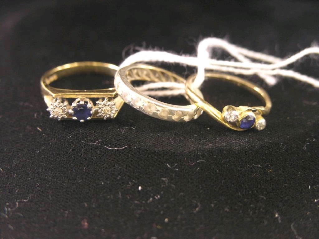 Appraisal: An ct gold ring set central blue stone and two