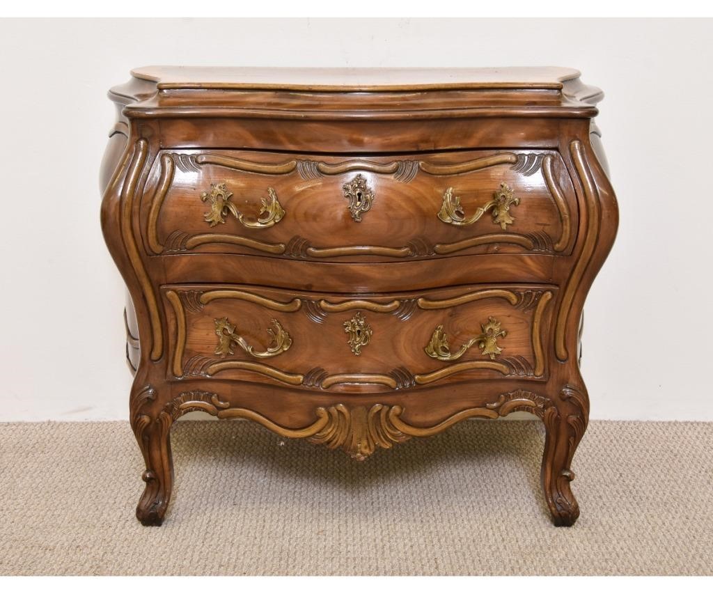 Appraisal: French Style olive wood bombe chest with a B Altman