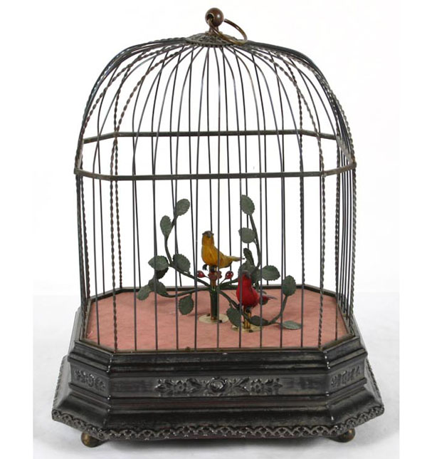 Appraisal: Victorian bird cage automaton with two birds Ebonized wood cage