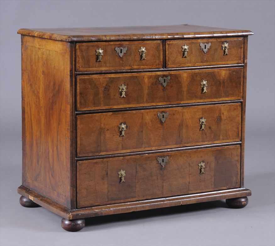 Appraisal: GEORGE I WALNUT CHEST OF DRAWERS TH CENTURY The quarter-veneered