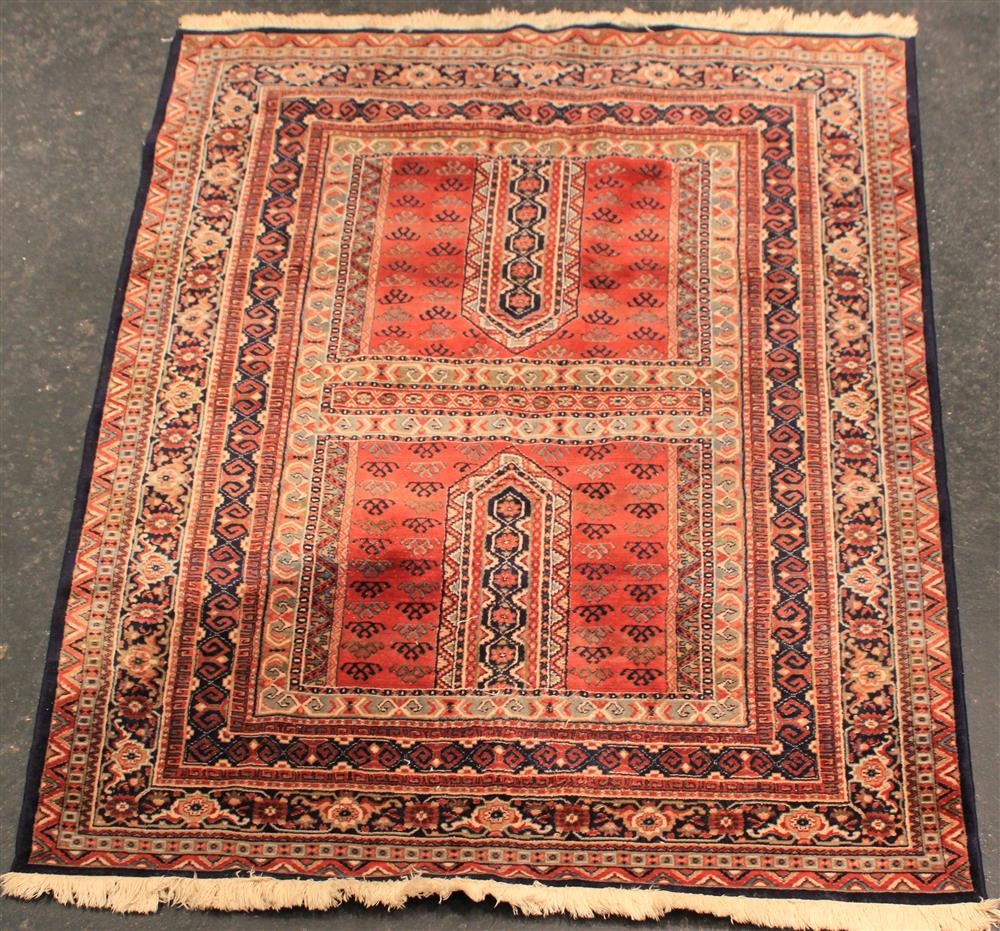 Appraisal: TRIBAL WOOL RUG primarily brick red black grey green and