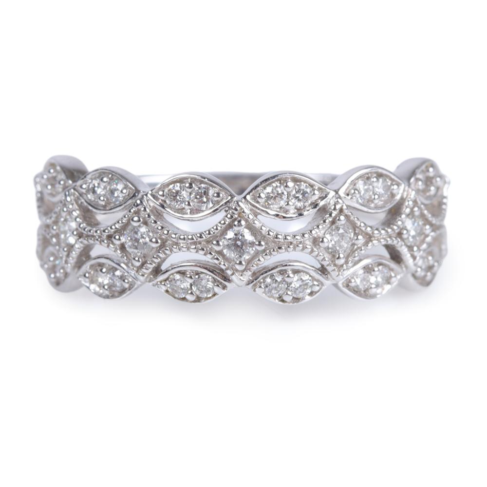 Appraisal: Modern designer K white gold diamond stacking ring with openwork