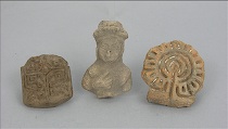 Appraisal: Pair of Ancient Terracotta Stamps and an Idol Fragment Clay