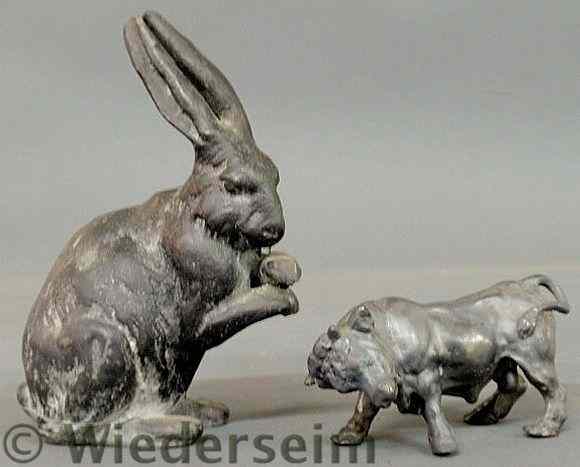 Appraisal: Lead seated rabbit figure h and a standing bull h