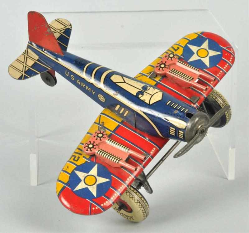 Appraisal: Tin Litho Marx Airplane Wind-Up Toy American Working US Army