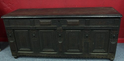 Appraisal: A th Century Italian oak coffer the hinged lid above