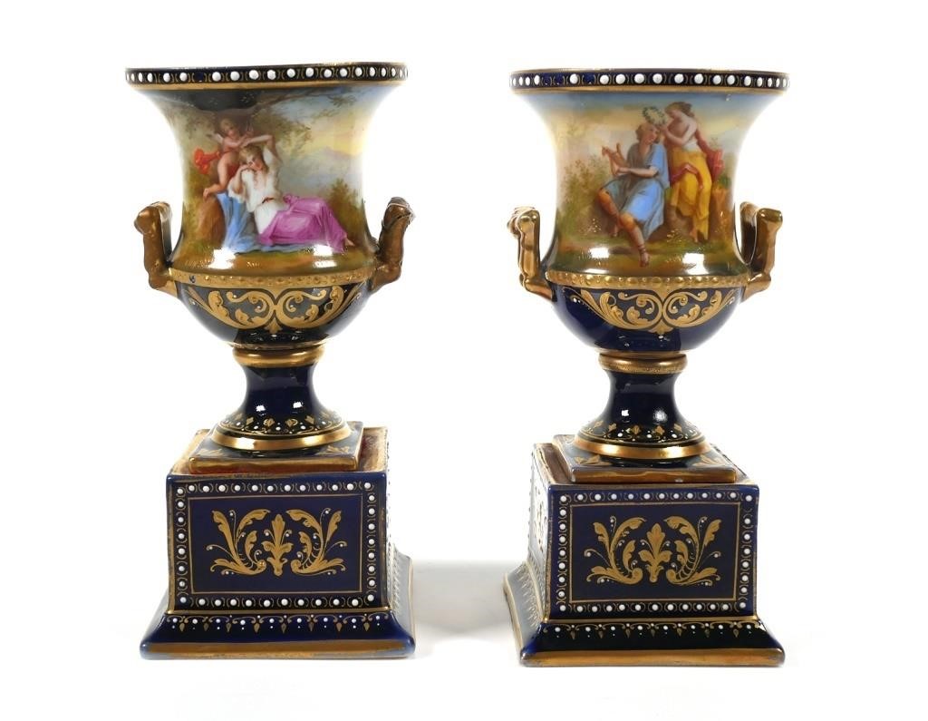 Appraisal: Pair antique Austria Royal Vienna porcelain pedestal urn vases Both