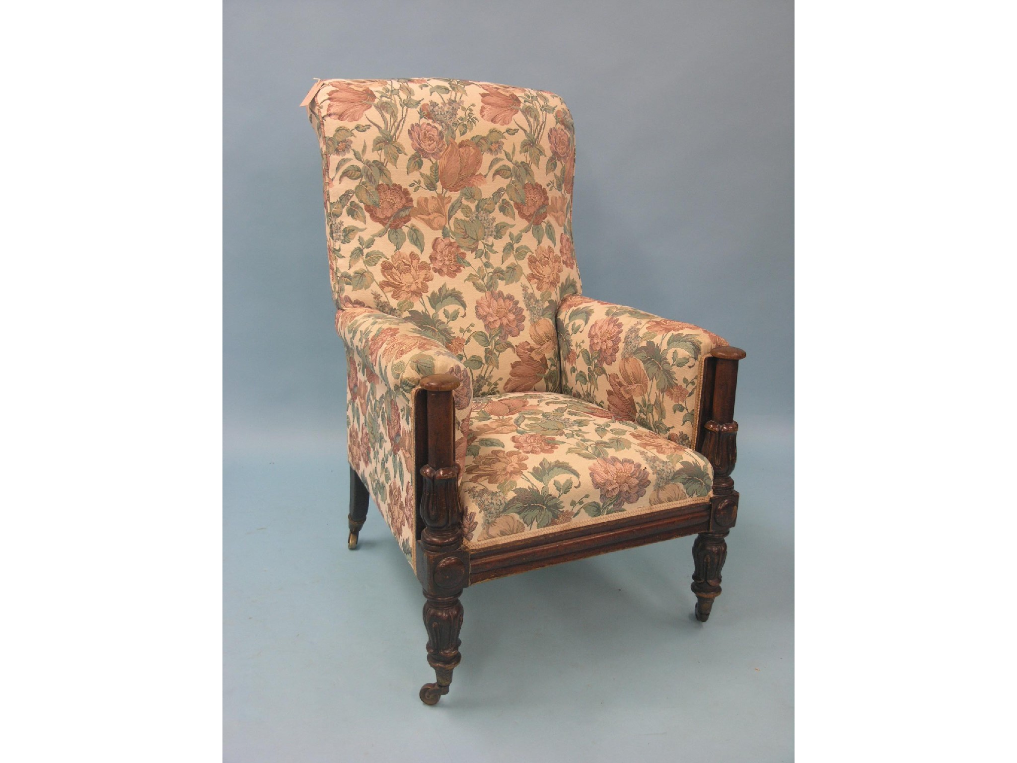 Appraisal: A William IV mahogany armchair tubular arm-supports with carved acanthus