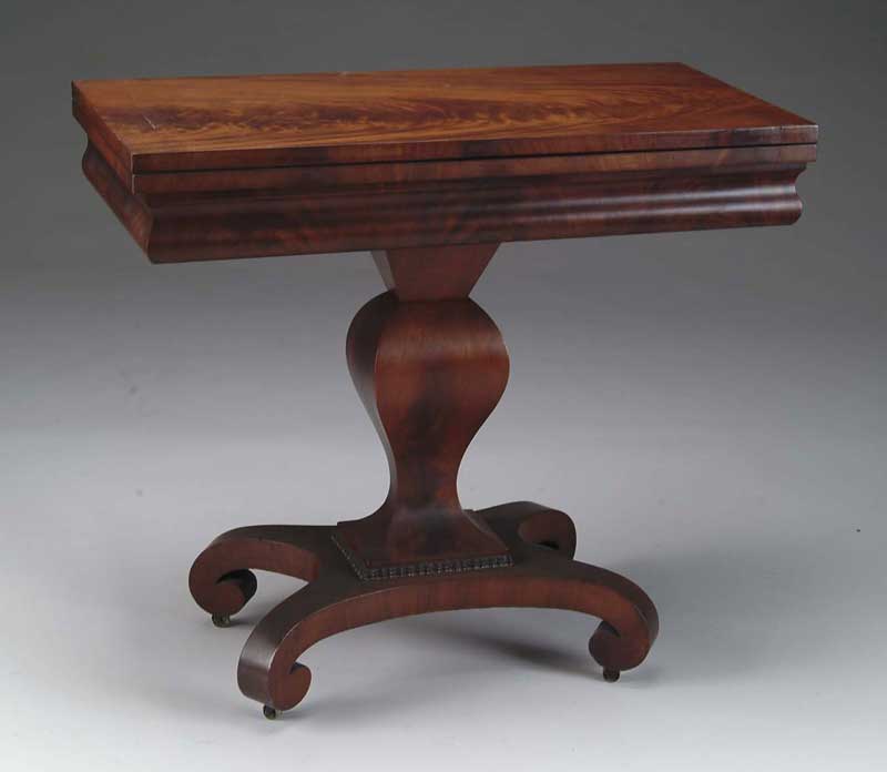 Appraisal: EMPIRE MAHOGANY CARD TABLE Rectangular top swivels and flips over