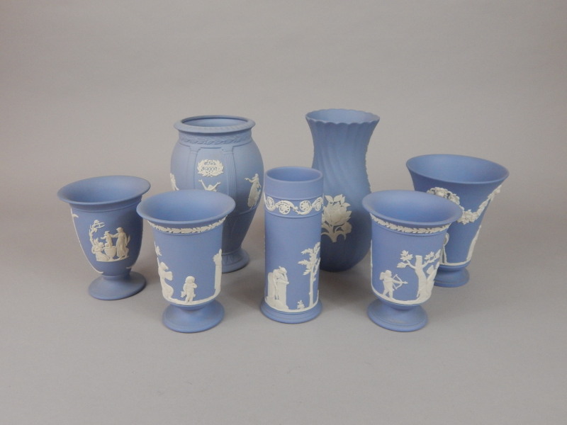 Appraisal: Seven Wedgwood blue Jasperware vases various shapes and forms each