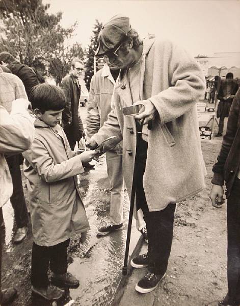 Appraisal: A photograph of Steve McQueen at the Le Mans circuit