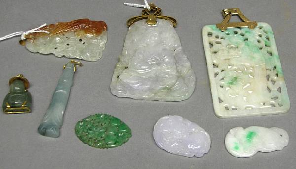 Appraisal: A group of eight jadeite decorations Including three pale green