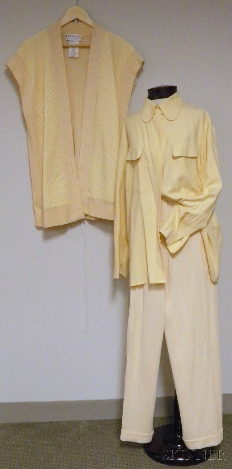 Appraisal: Lady's Three-piece Dino Valiano Ensemble comprised of cream wool trousers