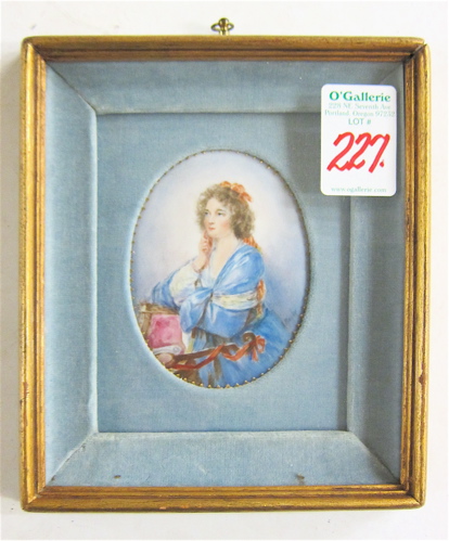 Appraisal: FRENCH MINIATURE OIL ON OVAL PORCELAIN Portrait of a young