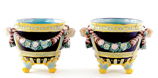 Appraisal: Pair majolica cachepots vibrantly glazed footed vessels adorned with mask