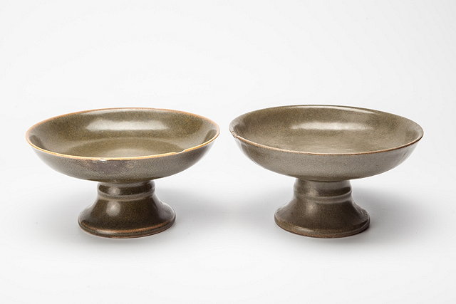 Appraisal: A PAIR OF CHINESE TEA DUST GLAZE TAZZAS impressed marks