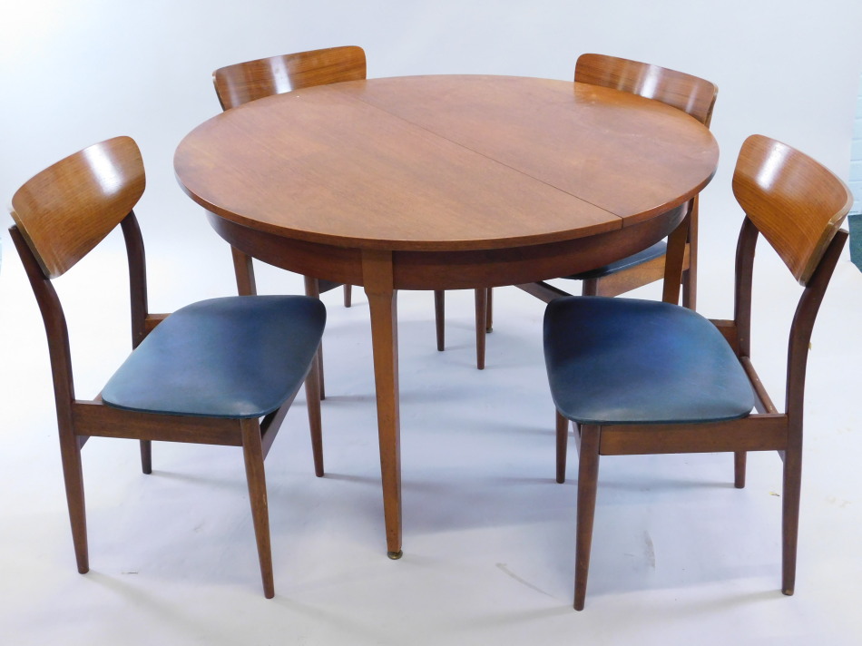 Appraisal: A 'G' plan type retro extending teak dining table and