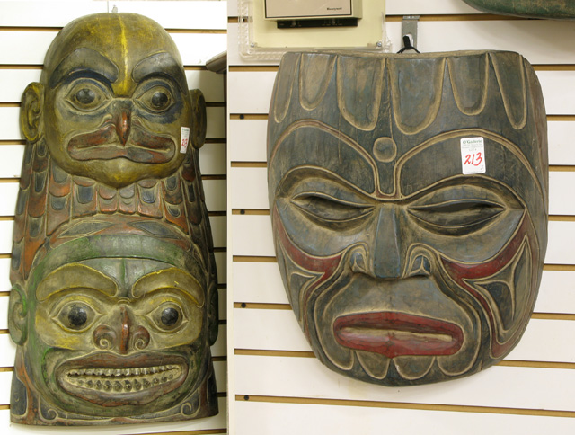 Appraisal: TWO CARVED AND PAINTED WOOD TRIBAL SPIRIT MASKS the largest