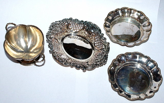 Appraisal: A PAIR OF SILVER BON BON DISHES of shaped circular