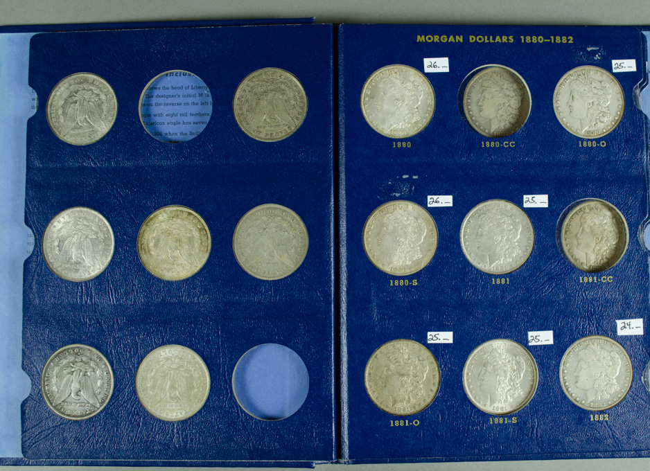 Appraisal: TWENTY-SIX U S SILVER MORGAN DOLLARS IN ALBUM - including