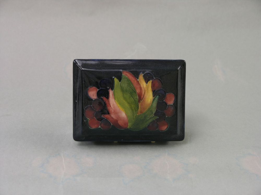 Appraisal: A Moorcroft box and cover Leaf and Berry rectangular shape