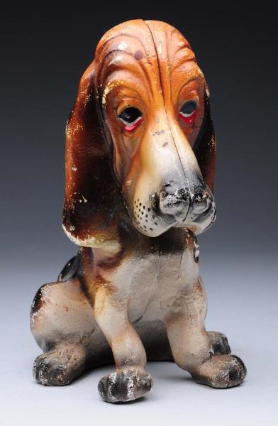 Appraisal: Cast Iron Bloodhound Dog Doorstop Full-figure Depicts whimsical sitting bloodhound